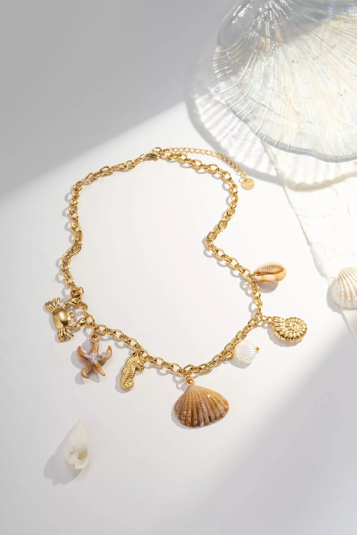 Collier a breloques coquillage Doré "Trésor Océanique"