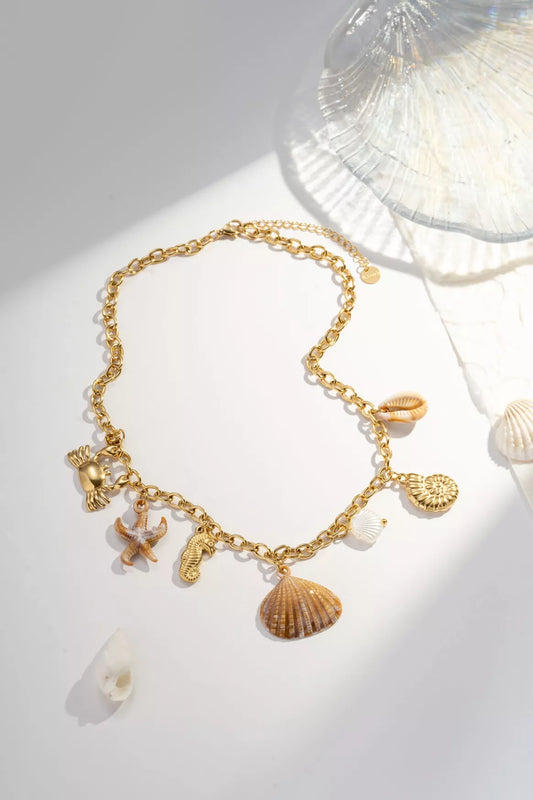 Collier a breloques coquillage Doré "Trésor Océanique"