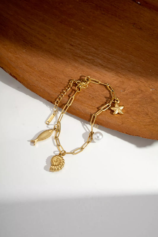 Bracelet à breloques marines doré